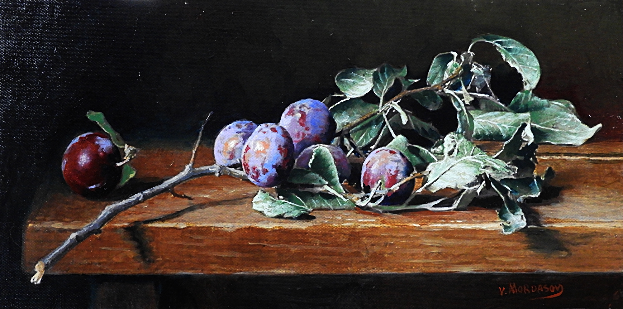 Plums on a branch